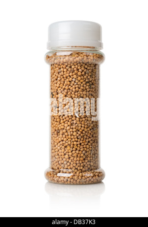 Mustard seeds in a glass jar isolated on white Stock Photo