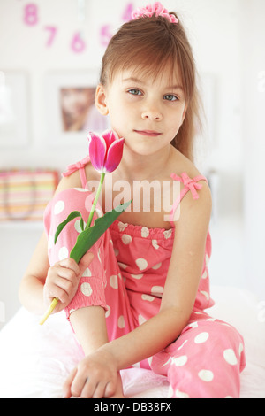 Child with flower Stock Photo