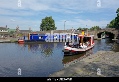 Linlithgow Union Canal society canal boat Victoria preparing to berth  on Union Canal  at Linlithgow basin in Scotland Stock Photo