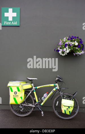 St Johns Ambulance First Aid station with response bike Stock Photo