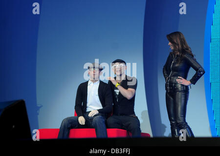 Jason Bradbury and Suzi Perry presenting The Gadget Show Live, Birmingham. 80,000 sell-out three day show and exhibition held in the NEC Birmingham featuring the stars of the TV show 'The Gadget Show'. Birmingham, England - 13.04.11 Stock Photo