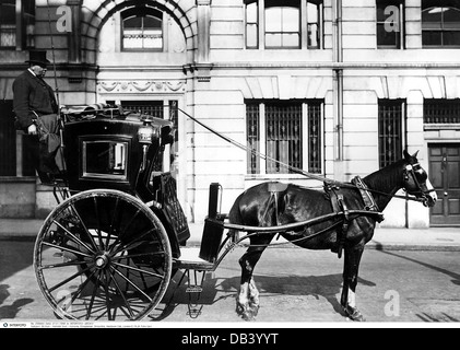 transport / transportation,coach,one-horse carriage,Handsom Cab,London,Great Britain,late 19th century,historic,historical,taxi,taxicab,cab,taxicabs,cabs,go by taxi,taxi,hail a taxi,coachman,coach driver,coachmen,side view,horse,uniaxial,vehicle,vehicles,transportation,vehicle,public transport,public transportation,public transit,public conveyance,passenger traffic,passenger transport,movement of persons,free movement of persons,means of transportation,means of transport,conveyance,passenger transport,passenger transportat,Additional-Rights-Clearences-Not Available Stock Photo
