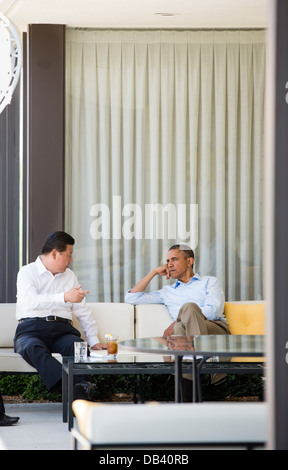 President Barack Obama and President Xi Jinping of the People's Republic of China talk before their bilateral meeting at the Annenberg Retreat at Sunnylands in Rancho Mirage, Calif., June 8, 2013. Stock Photo