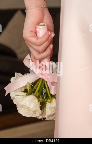 Close up of Bride holding bridal bouquet