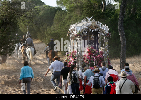 Catholic pilgrims making the annual pilgrimage to El Rocio through the Donana National Park in Spain Stock Photo