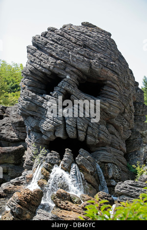 Creepy Skull Rock waterfall in Disneyland Paris, Marne-la-Vallée, near Paris, France. Stock Photo