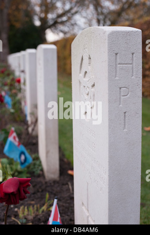 Close-up of headstones in a row (side view) in Commonwealth War Graves Commission (CWGC) cemetery - Stonefall Cemetery, Harrogate, Yorkshire, England. Stock Photo