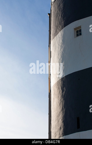 The striped facade of Hook lighthouse located at Hook head is one of the oldest lighthouses in the world in Count Wexford Stock Photo