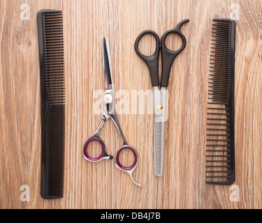 Barber accessories on wooden table Stock Photo