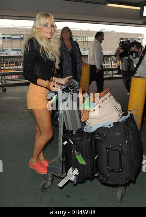 Pixie Lott arrives at Heathrow Airport London, England - 20.04.11 Stock Photo