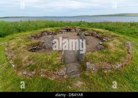 House 3 of the Barnhouse Neolithic Village with the Loch of Harray in the background. Stock Photo