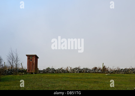 Old outside toilet Stock Photo