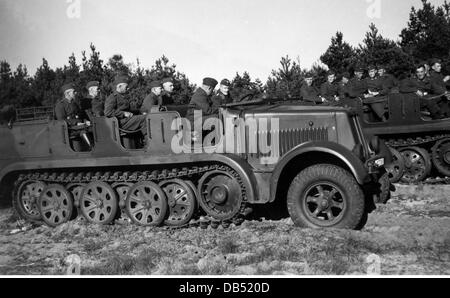 Nazism / National Socialism, military, Wehrmacht, Luftwaffe, soldiers of an anti-aircraft artillery unit with half-track tractors Sonderkraftfahrzeug 7, circa 1940, air force, Second World War, WWII, vehicle, vehicles, tractor, AA, Sdkfz., 20th century, historic, historical, Germany, prime mover, people, 1930s, 1940s, Additional-Rights-Clearences-Not Available Stock Photo