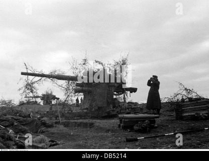 events, Second World War / WWII, Russia 1944 / 1945, Crimea, Sevastopol, German 88 mm anti-aircraft guns Flak 36/37 in firing position against ground targets, 30.4.1944, Eastern Front, USSR, Wehrmacht, Luftwaffe, AA, gun, artillery, emplacement, shield, 20th century, historic, historical, Soviet Union, soldiers, soldier, observing, watching, camouflage, 8.8 cm, people, 1940s, Additional-Rights-Clearences-Not Available Stock Photo