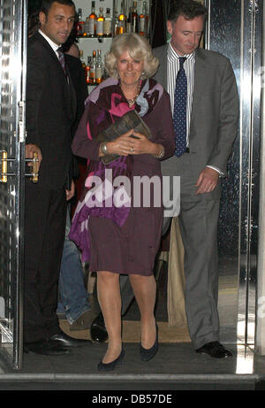 Camilla, Duchess of Cornwall leaving Locanda Locatelli restaurant after dining with her son Tom Parker Bowles and Sara Parker Bowles London, England - 27.04.11 Stock Photo