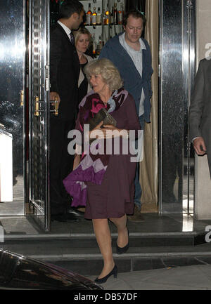 Camilla, Duchess of Cornwall leaving Locanda Locatelli restaurant after dining with her son Tom Parker Bowles and Sara Parker Bowles London, England - 27.04.11 Stock Photo