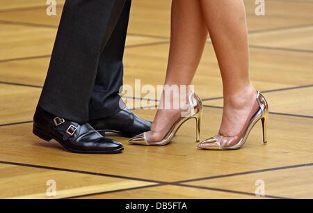 Leipzig, Germany. 24th July, 2013. Models present women's shoes in ...