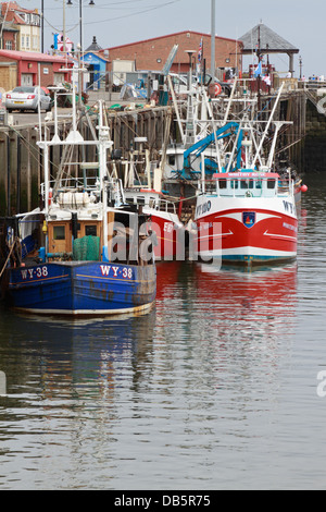 Trawlers in Whitby harbour, Whitby, North Yorkshire, England, UK. Stock Photo