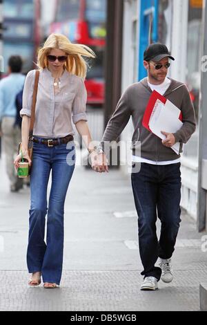 Matthew Vaughn and his wife, Claudia Schiffer take a stroll together in Notting Hill London, England - 03.05.11 Stock Photo