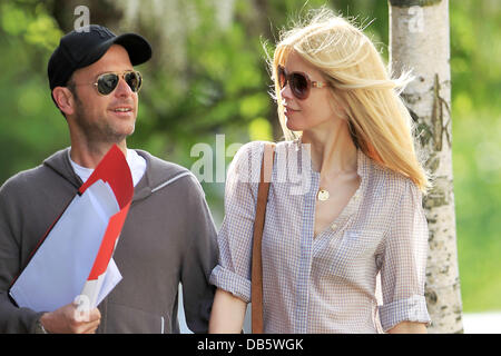 Matthew Vaughn and his wife, Claudia Schiffer take a stroll together in Notting Hill London, England - 03.05.11 Stock Photo