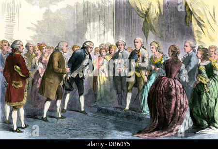 Benjamin Franklin presented to Louis XVI and Marie Antoinette at the French court. Hand-colored woodcut Stock Photo