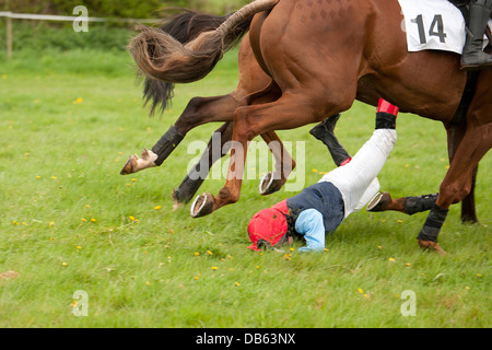 Horse rider dragged by horse Stock Photo