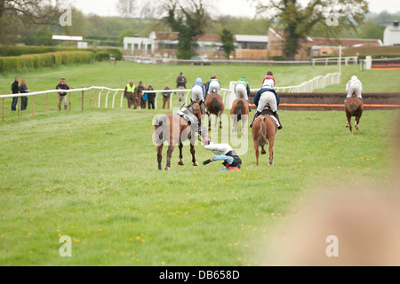 Horse rider dragged by horse Stock Photo