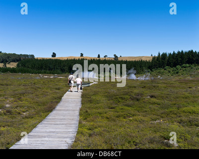 dh Craters of the Moon TAUPO NEW ZEALAND Elderly couple walking over thermal landscape on Geothermal Walk hot springs Stock Photo