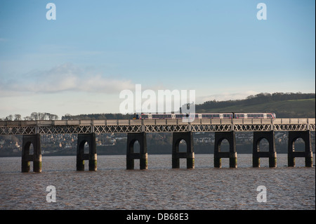 First Scotrail train crossing the Tay Rail Bridge spanning the Firth of Tay, Scotland. Stock Photo