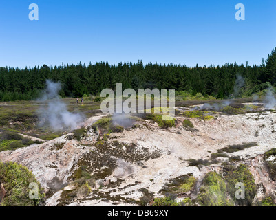 dh Craters of the Moon TAUPO NEW ZEALAND Tourists walking Thermal landscape on Geothermal Walk steam vents crater Stock Photo
