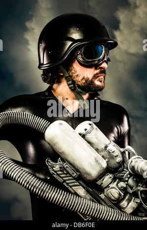 Warrior of the future with huge laser cannon shotgun over cloudscape Stock Photo