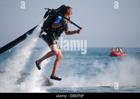 Jetlev, a personal flying machine. Flying, based on a water-propelled jetpack, near Marbella, Costa del Sol, Spain. Stock Photo