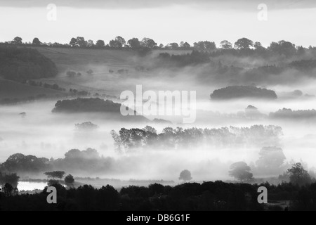 Mist fills lower Wharfedale close to the village of Weeton, North Yorkshire Stock Photo