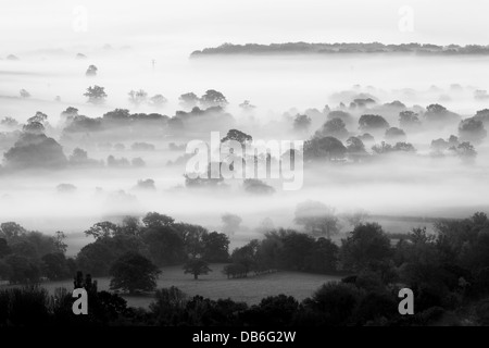 Mist fills lower Wharfedale close to the village of Weeton, North Yorkshire Stock Photo