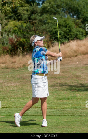 Buckinghamshire golf club, Denham, Buckinghamshire, UK, 24 July 2013 - ISPS Handa Ladies European Masters 2013 - practice day.  Elisabeth Esterl (Germany) takes her approach shot to the 16th hole. Credit:  Stephen Chung/Alamy Live News Stock Photo