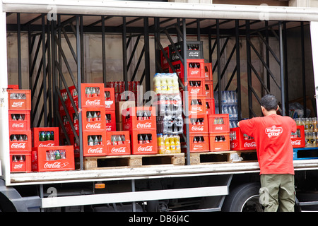 curtain sided lorry delivering soft drinks coca cola in Barcelona Catalonia Spain Stock Photo