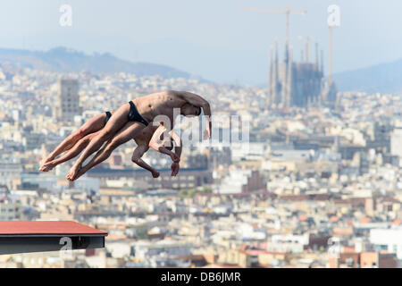 Barcelona, Spain. 21st July 2013: Belarus's Evgeny Karaliou and Vadim Kaptur jump off the platform the ten-meter synchro platform competition at the 15th FINA World Championships in Barcelona Stock Photo