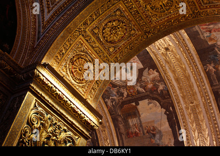 High Baroque architecture style decorations at the nave of the 17th century Roman Catholic St John's Co-Cathedral dedicated to Saint John the Baptist in Valletta the capital city of Malta island Stock Photo