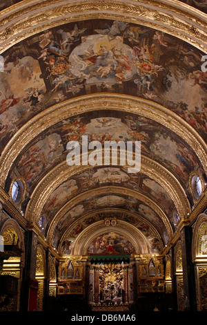 High Baroque architecture style decorations at the nave of the 17th century Roman Catholic St John's Co-Cathedral dedicated to Saint John the Baptist in Valletta the capital city of Malta island Stock Photo