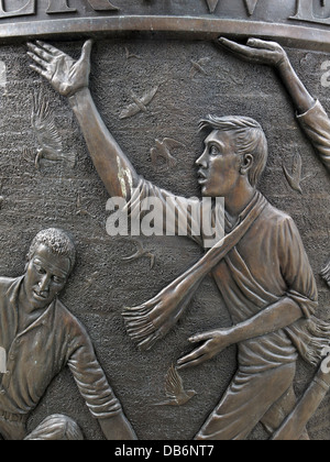 Detail from the 7 foot high circular bronze Hillsbrough memorial in the Old Haymarket district of Liverpool city centre - Hillsborough Stock Photo