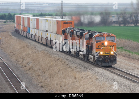 BNSF double stack container intermodal freight train at Wellington KS USA Stock Photo