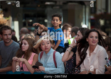 Leicester Square, London, UK. 24th July, 2013. Fans wait for Alan Partridge, aka Steve Coogan, at the west end premier of his latest film 'Alpha Papa' .  Credit:  Lee Thomas/Alamy Live News Stock Photo