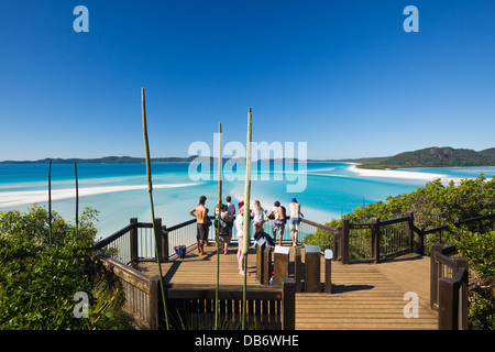 Tourists at the scenic lookout overlooking Hill Inlet and Whitehaven Beach. Whitsunday Island, Queensland, Australia Stock Photo