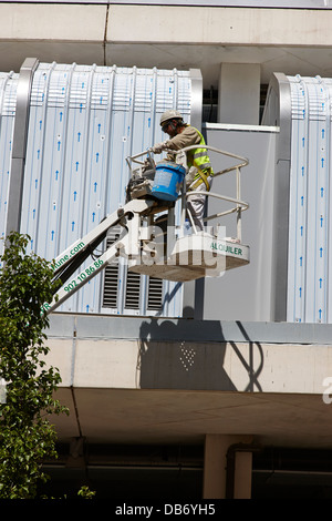worker on elevated working platform Barcelona Catalonia Spain Stock Photo