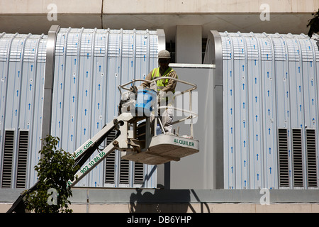 worker on elevated working platform Barcelona Catalonia Spain Stock Photo