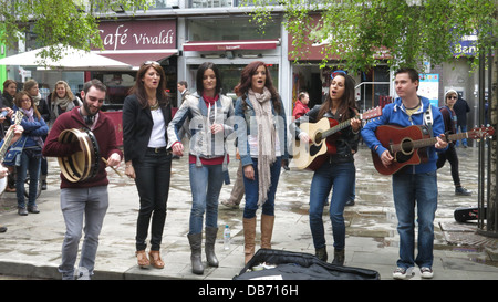 Image of a surprise busking performance by Irish pop group B*Witched in Temple Bar Square in Dublin city centre. Stock Photo