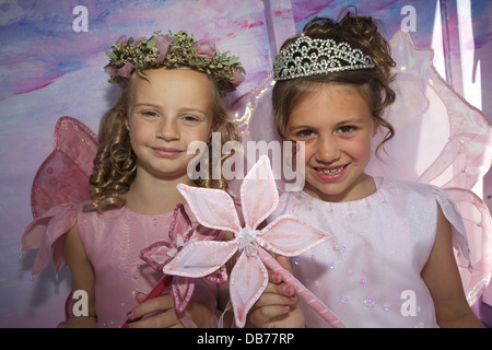 Celebrating the 2013 St Tudy Carnival are a Carnival and Fairy queen. Stock Photo