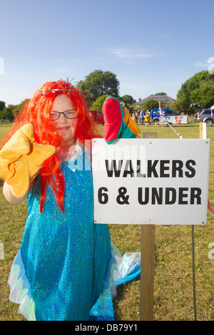 Celebrating the 2013 St Tudy Carnival is a mermaid in the walkers group Stock Photo