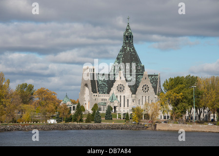 Canada, Quebec, St. Lawrence River at Three Rivers (aka Trois-Rivieres), church. Stock Photo