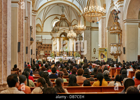 Interior shot, mass in Catedral Metropolitana, cathedral of Sucre, Bolivia, South America Stock Photo
